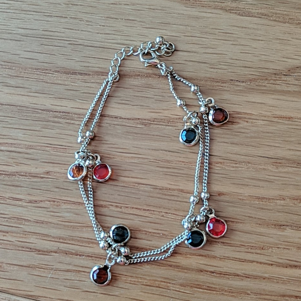Gold double strand bracelet w/green, red, & orange